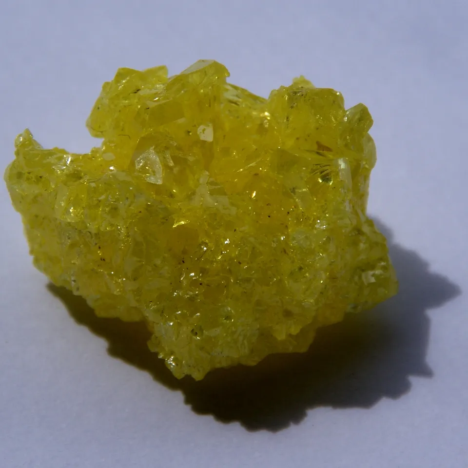 Reference photograph of sulfur crystals, not a perfume ingredient
